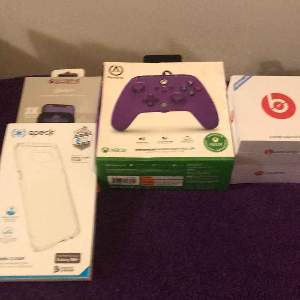 Purple Xbox Enhanced Wired Controller plus Oura Ring Charging Case & Phone Acce